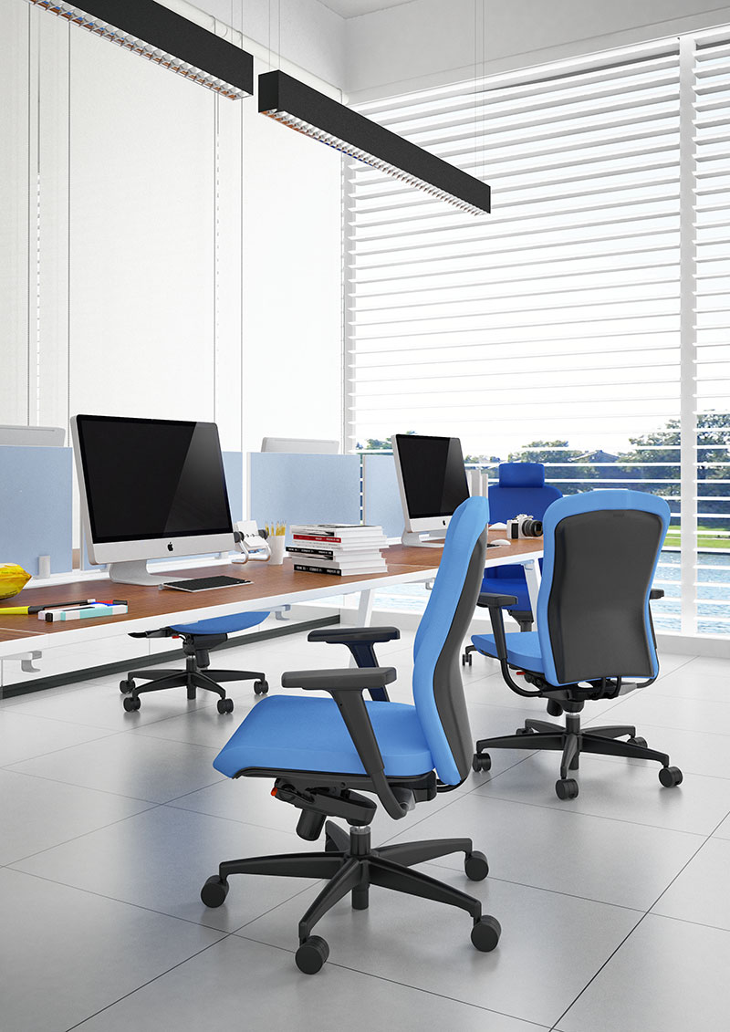 Team chair in blue fabrics infront of Klug workstation