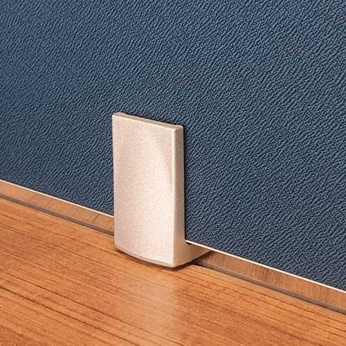 artiv panel holder holding a fabric panel on a wooden table top