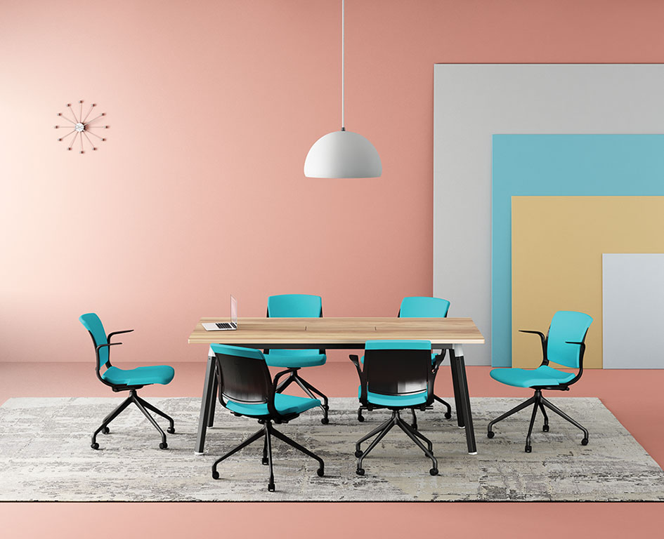 Myko chairs in castors with Artiv meeting table in a pink room