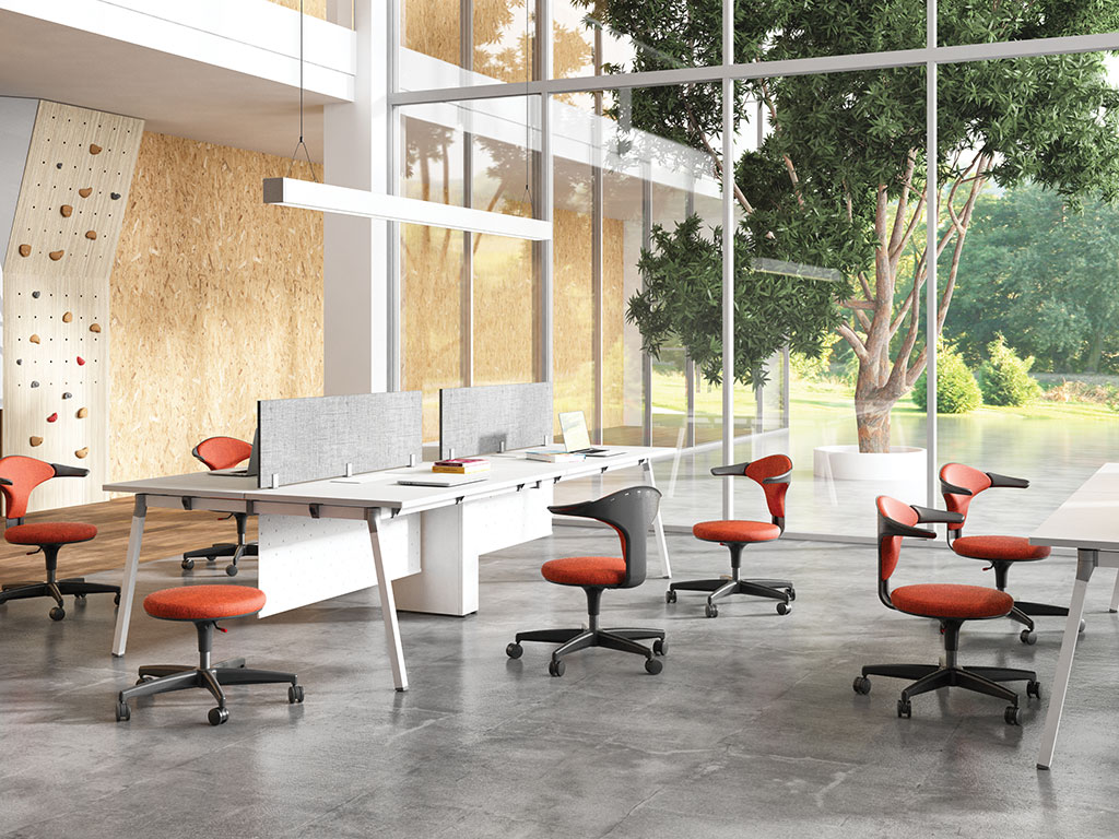 Ginko chair in deep orange fabric with Artiv workstation in an office with a climbing wall