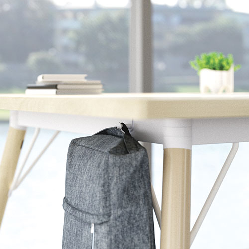 A grey bag hang using the bag hook of Forum table