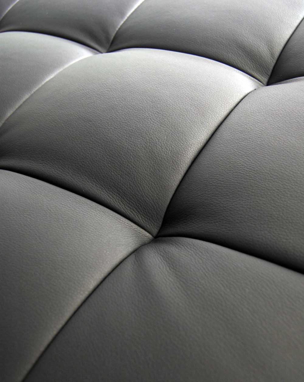 closeup of leather stitching of como face padded bench