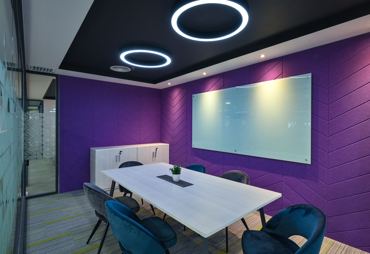 Purple discussion room with Artiv meeting table