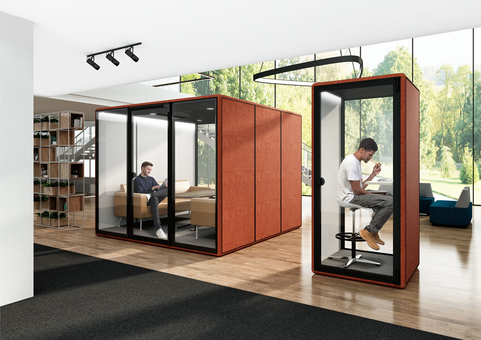 large conference pod and mini pod in orange fabric beside a breakout area