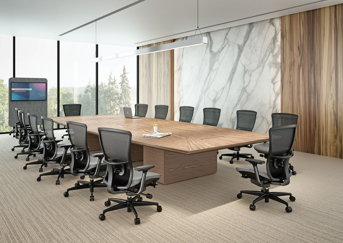 sunburst meeting table with soul v2 office chair in a large conference room